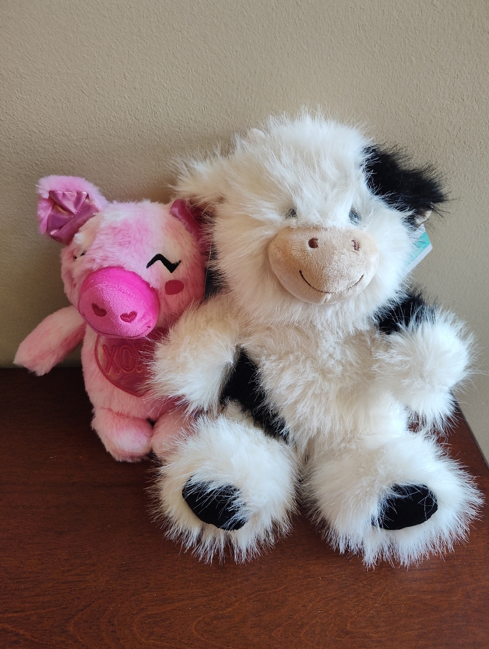 Plush Pink Pig and Fluffy Black-and-White Cow Stuffed Animals